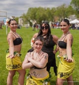 a group of women in traditional Chilean style clothing