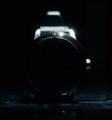 a watch with a black watch face and a watch on it