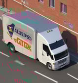 A bright yellow delivery van with the words 'DIE POST' in black and a red cross logo is parked on a street in front of a red building. The building has several windows with closed shutters.