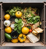 a box of food waste  that is sitting in a box