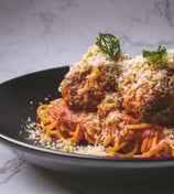 a plate of spaghetti sauce and meatballs at Tony's Sukhumvit 11 Italian Restaurant Bangk