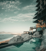 a pool with a view of a beach