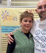 a man and woman standing next to each other