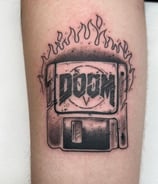 a tattoo style tattoo of a computer mouse on a computer monitor
