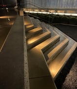 concrete steps illuminated with step lights