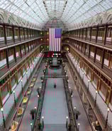 photographer picture of a large atrium with an American flag on the ceiling