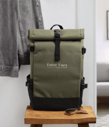 a backpacker's backpacker bag with sunglasses on a wooden table