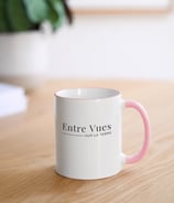 a mug of coffee mug with a pink mug