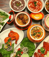 Punjabi cuisine on Zayka Caterers’ menu, featuring Tandoori Chicken, Gravies, Biryani and more.