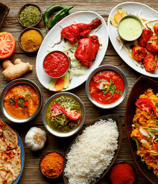 Zayka Caterers’ menu photo of Eastern Indian cuisine with fish curry, rice and luchi