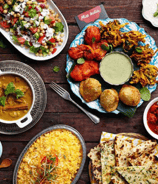 Zayka Caterers’ menu image of Kashmiri cuisine with rogan josh, naan, Dum aloo and more