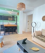 a living room with a couch and a table