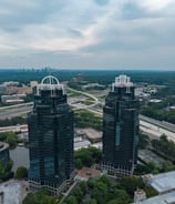 King and Queen Towers from a distance. City of Atlanta in the background