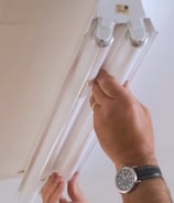 putting a fluorescent lamp in its proper position