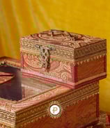 a pair of wedding boxes with a clock on top