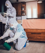 a man in a white suit and a woman in a white suit