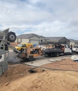a cement mixer truck is parked in a lot