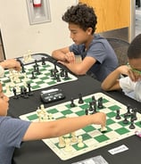Children playing chess at a practice chess tournament at the Henderson Multi-Gen Rec Center in NV