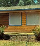 40 years of old stains removed for a fresh coat on this Log Home!