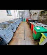 various commercial sized bins and wheeled bins contained with a bin store 