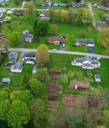 a neighborhood with a lot of houses and trees