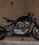 custom black sportster redesigned with turbo engine.
