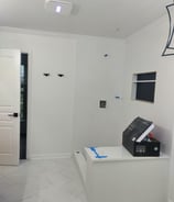 a room with a printer and a printer on the floor