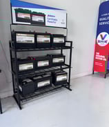 a display of batteries and batteries in a store