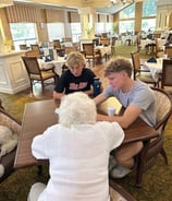 Assistance for seniors facing technology challenges in assisted living communities.