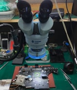 a microscope microscope and some tools on a table