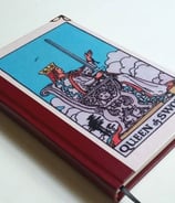 a book with a picture of a tarot of tarot