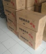 a pile of boxes with boxes of binchotan on them