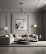 A laptop displaying a webpage with several interior design images is placed on a wooden table. Behind it, a gray couch and a round mirror on the wall can be seen, suggesting a cozy room setup. Soft lighting filters through sheer curtains in the background.