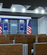 a room with chairs and a podium with flags