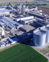 a large industrial plant with a large amount of grain silos