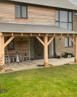 backgarden with new porch built by Lakes building and plastering services