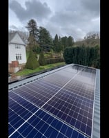 a solar paneled roof with solar panels and solar panels