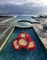 Lord Ganesha flower decoration on water