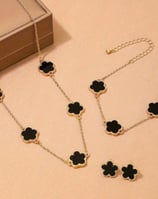 a necklace with a black clover clover clover necklace