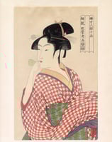 Beauty Blowing a Glass Pipe