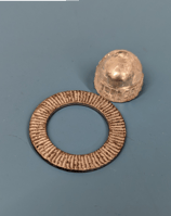 a metal object with a ring on it