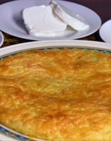 Egyptian Fateer (fatir) served with savoury cheese فطير مصري مع جبن أبيض