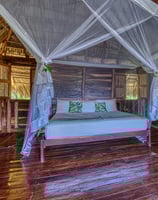 kingsize bed wooden bungalow