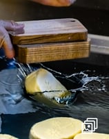 a person is making a butter