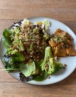 a plate of food with a salad and a fork