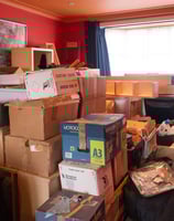 a room with boxes of boxes and boxes of boxes, estate sales, junk