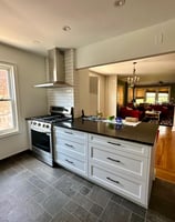 a kitchen with a stove top oven and a stove top