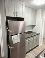 a refrigerator with a refrigerator and a refrigerator freezer