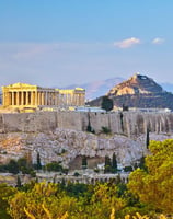 a view of a city with a view of the acropoliss of the ac