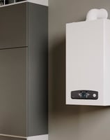 a white boilerer with a white tankless water heater